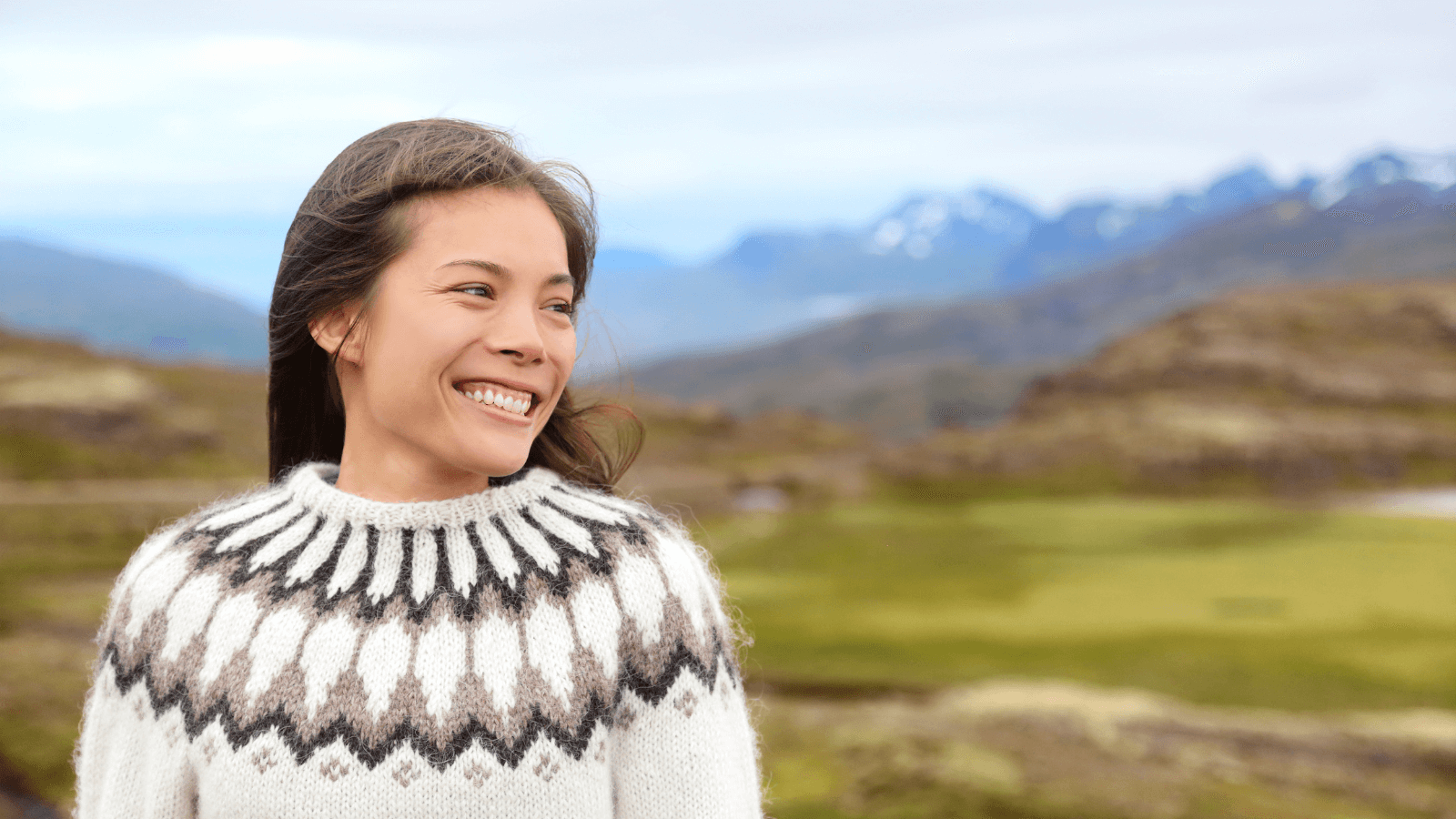 Woman wearing an Icelandic sweater or lopapeysa in Iceland.